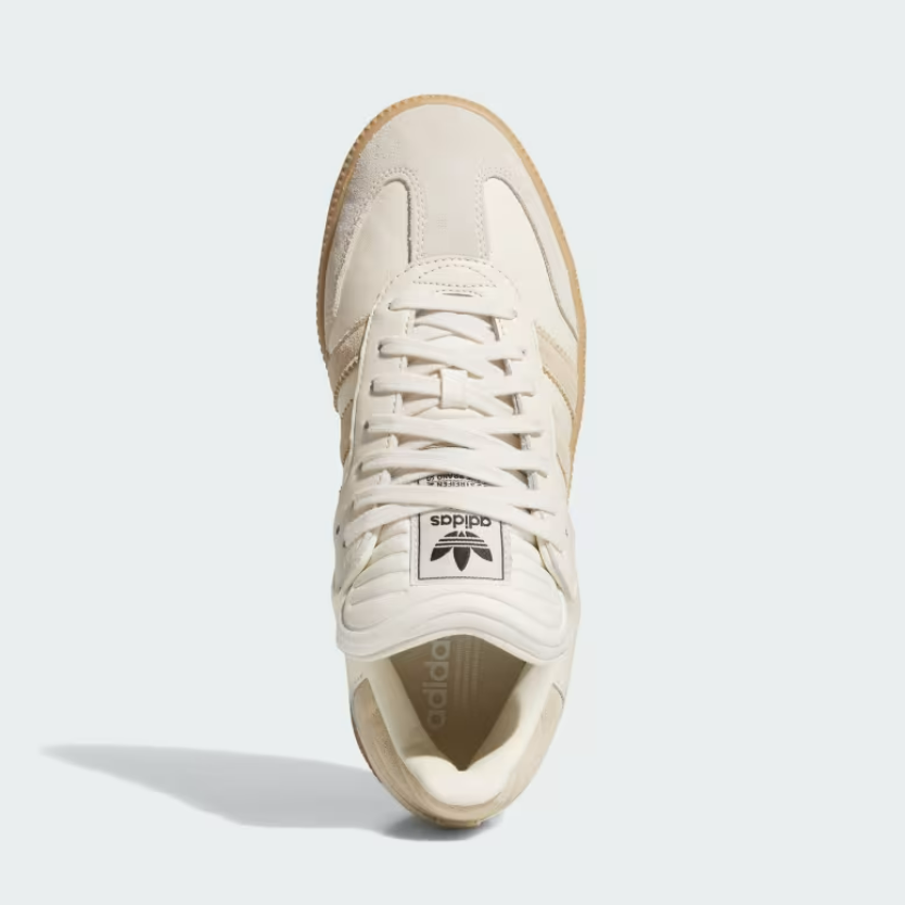 tan and white adidas