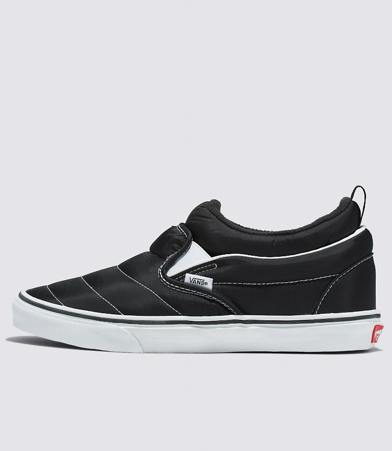 White and black deals vans slip ons